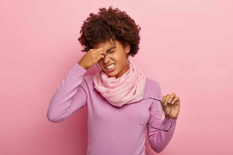 fatigue-exhausted-woman-massagees-eyes-feels-discomfort-from-pain-after-reading-long-time